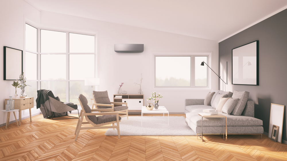 Klimatyzator Fujitsu KETF-B w jasnym salonie z dużymi oknami, szarą sofą i drewnianą podłogą